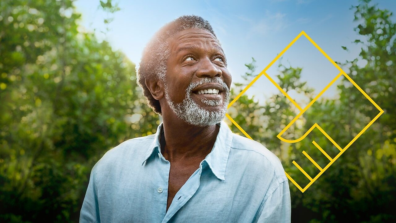 Smiling man with a beard in front of trees with an outline of the Generating shareholder value graph
