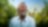 Smiling man with a beard in front of trees with an outline of the Generating shareholder value graph