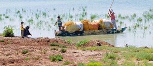 Local people on the Yabani Canal in the South of Iraq